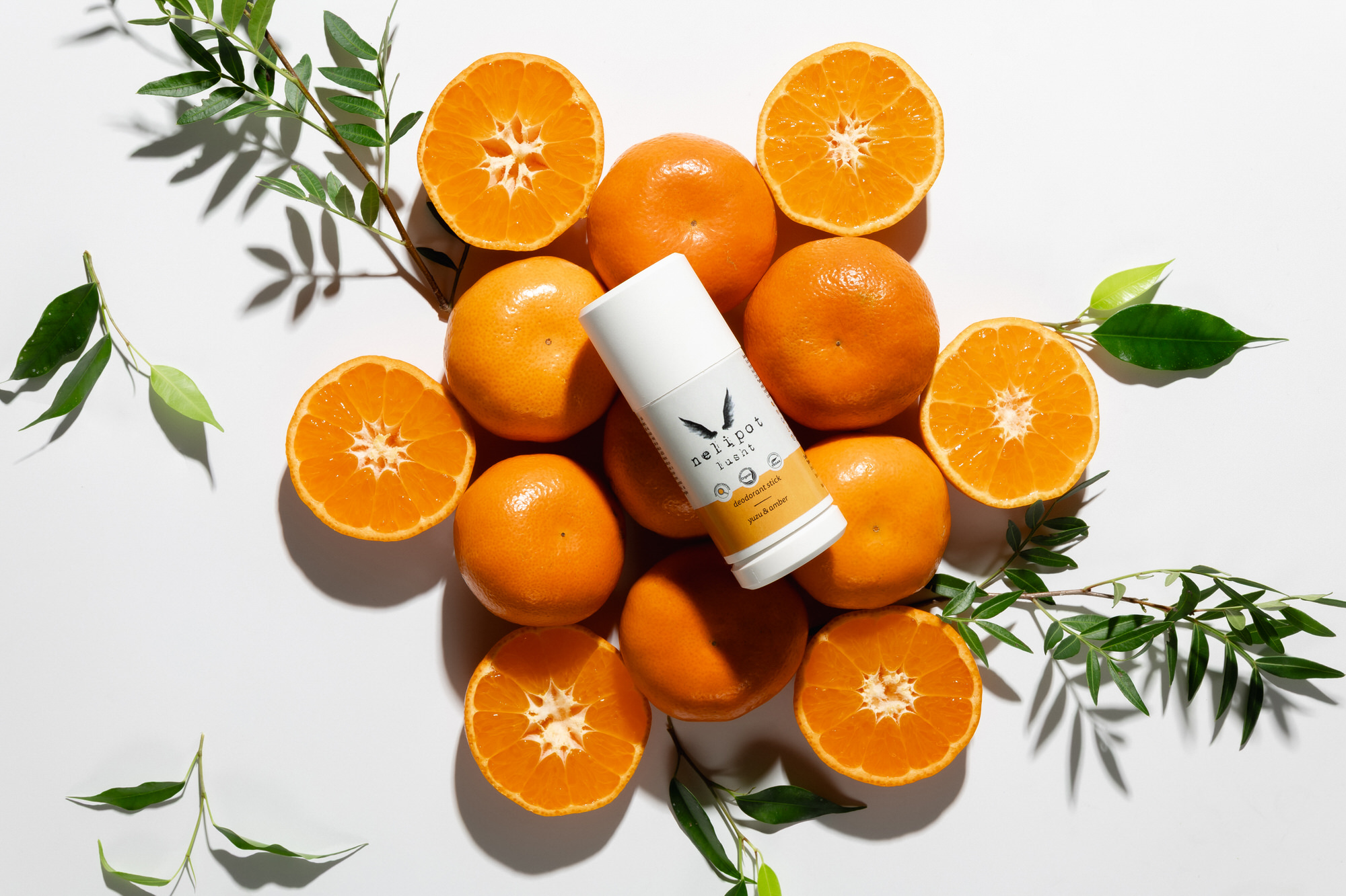 Nelipot Lusht deodorant v stiku med mandarinami